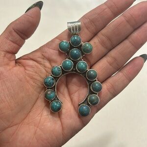 Squash blossom sterling silver and turquoise pendant